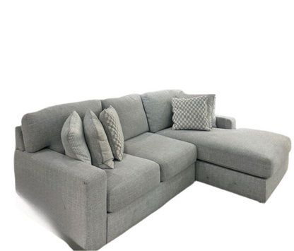 Sofa L Minimalis “Grey Haven” – Elegan, Luas & Nyaman